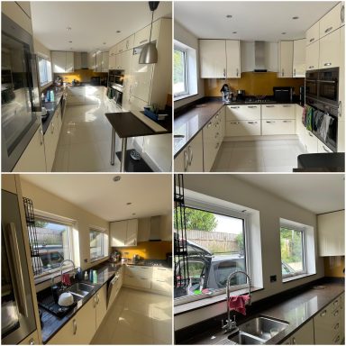 Modern kitchen featuring sleek cabinets, stainless steel appliances, and ample natural light.